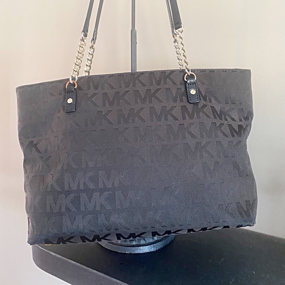 Michael Kors Handbags - 🌈 Michael Kors Black MK Embossed Canvas Shoulder Bag with Gold Hardware 🌈